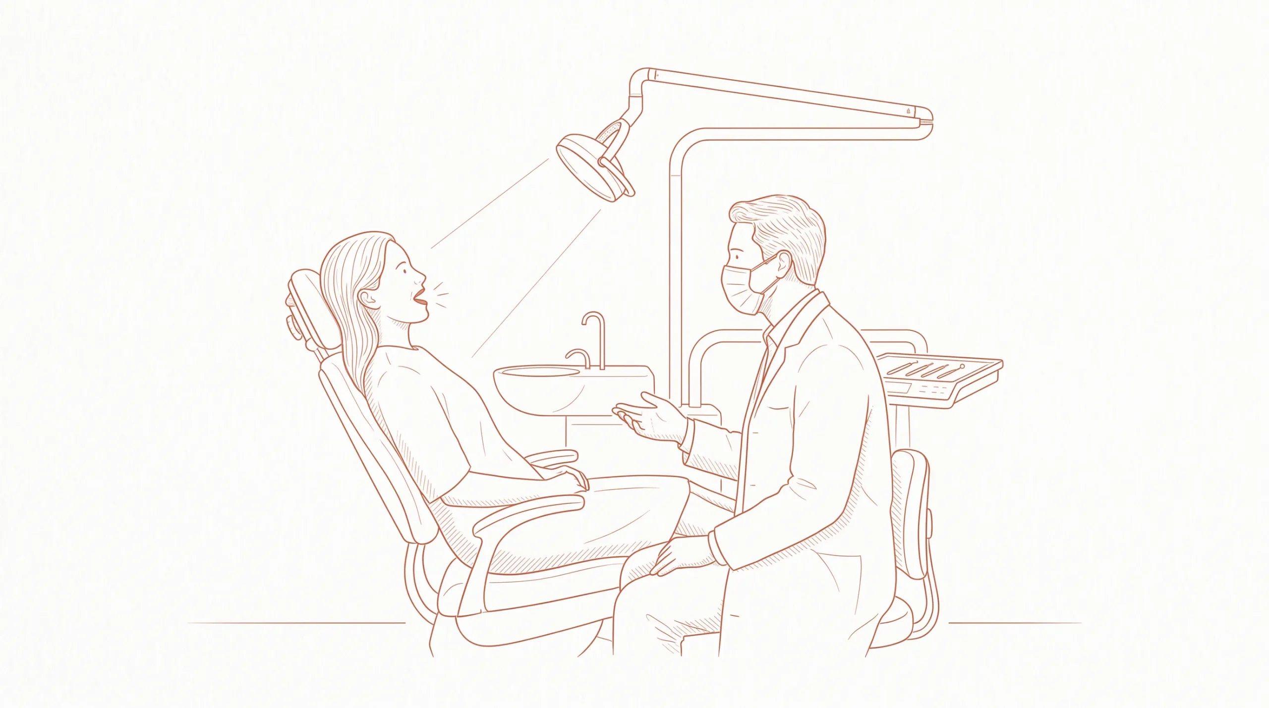 An adult sits with a dentist during a dental check-up, with the mouth being examined in a tidy clinic room.